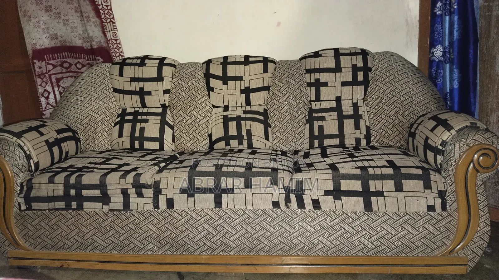 This is a Teak Wood Sofa