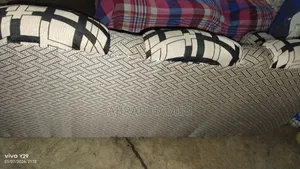 This is a Teak Wood Sofa