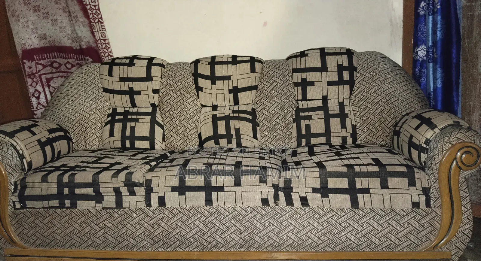 This is a Teak Wood Sofa