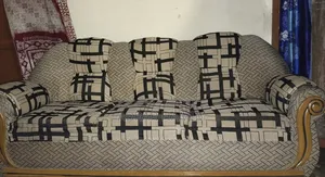 This is a Teak Wood Sofa