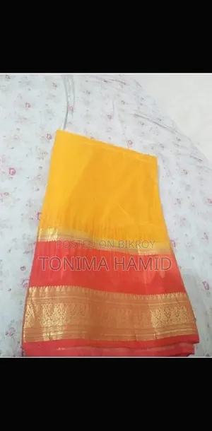 হলুদের কাতান শাড়ী
