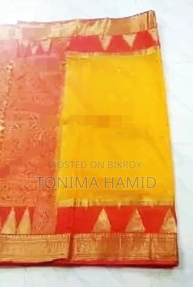 হলুদের কাতান শাড়ী