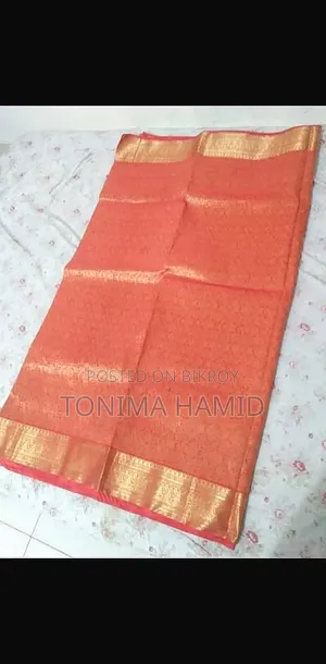 হলুদের কাতান শাড়ী
