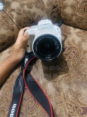 সাদা Canon Eos 100d ডিএসএলআর ক্যামেরা (১৮-৫৫ মিমি কিট লেন্স অন্তর্ভুক্ত)