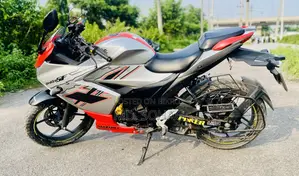 সুজুকি জিক্সার এসএফ এফআই ২০২৪ অরেঞ্জ