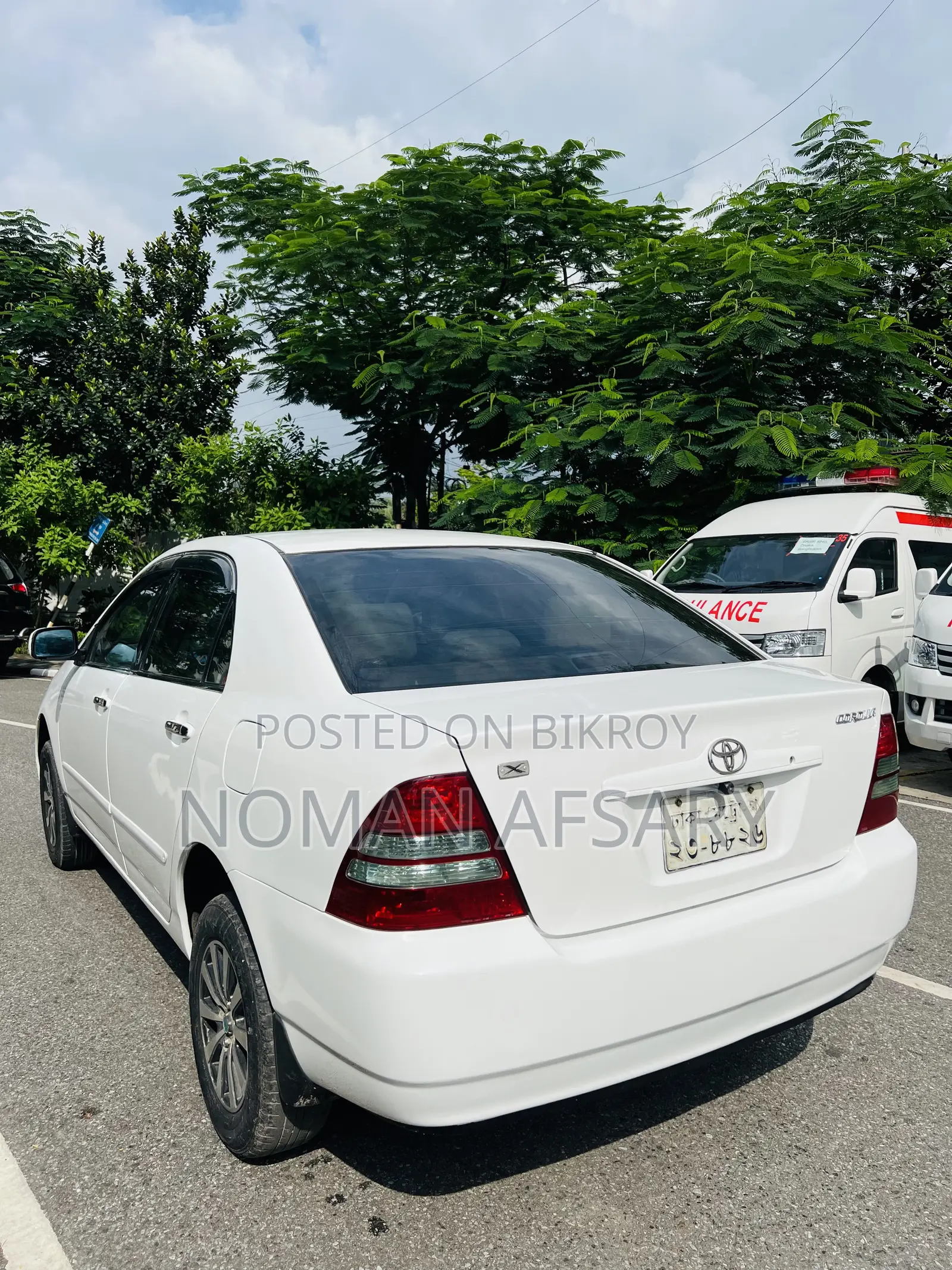 টয়োটা করোলা সেডান অটোমেটিক ২০০৩ সাদা