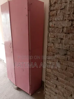 Pink colored shelf in good condition