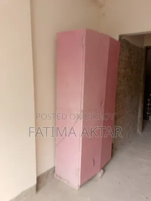 Pink colored shelf in good condition