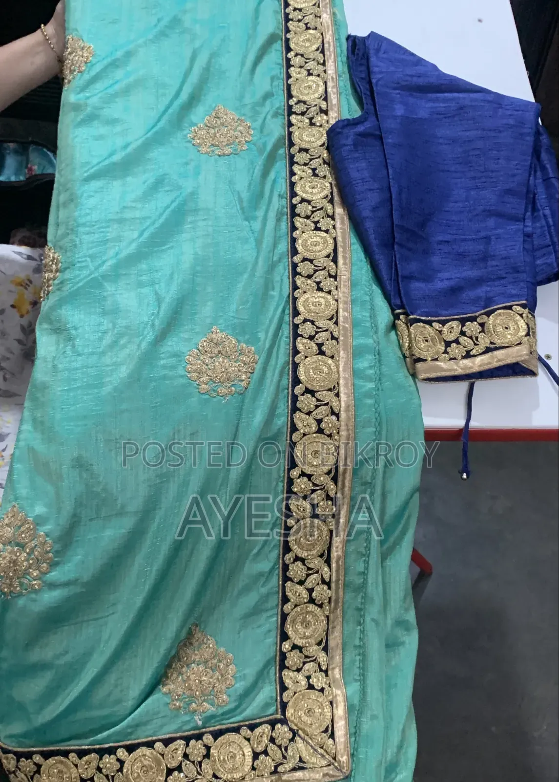 Sea Green Silk Saree With Navy Blue Embroidered Border