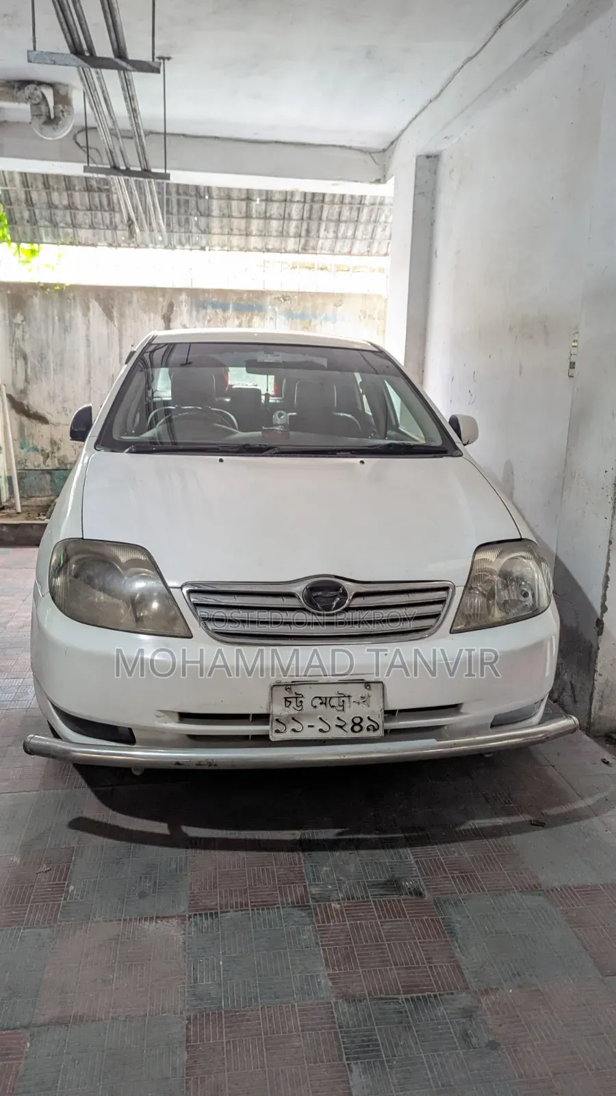 টয়োটা করোলা ২০০৩ সাদা