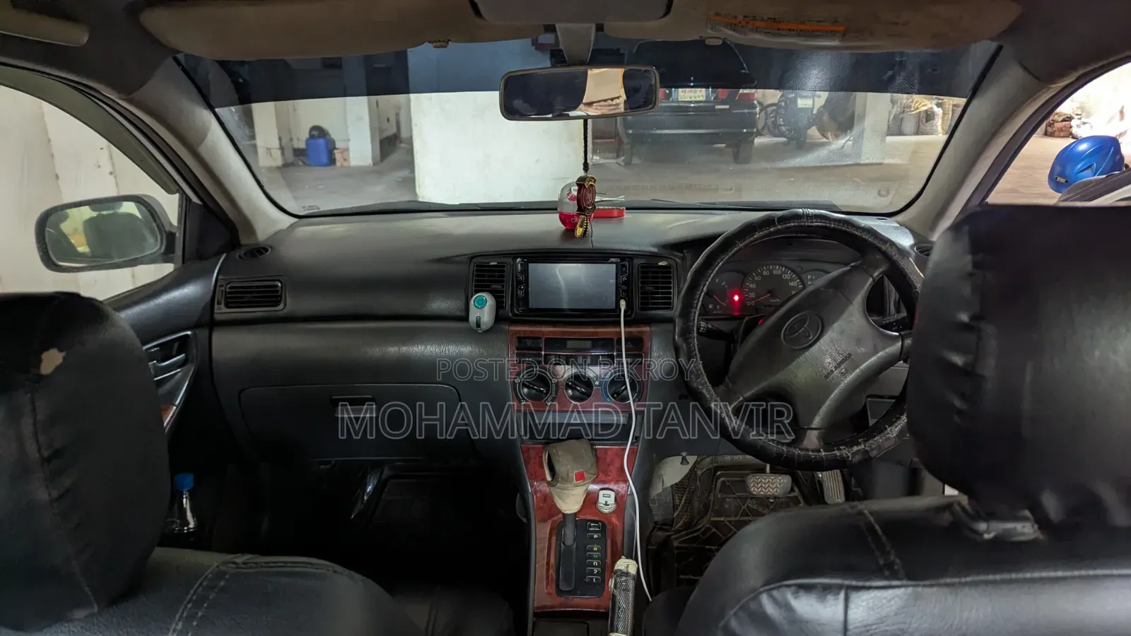 টয়োটা করোলা ২০০৩ সাদা