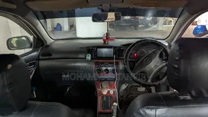 টয়োটা করোলা ২০০৩ সাদা