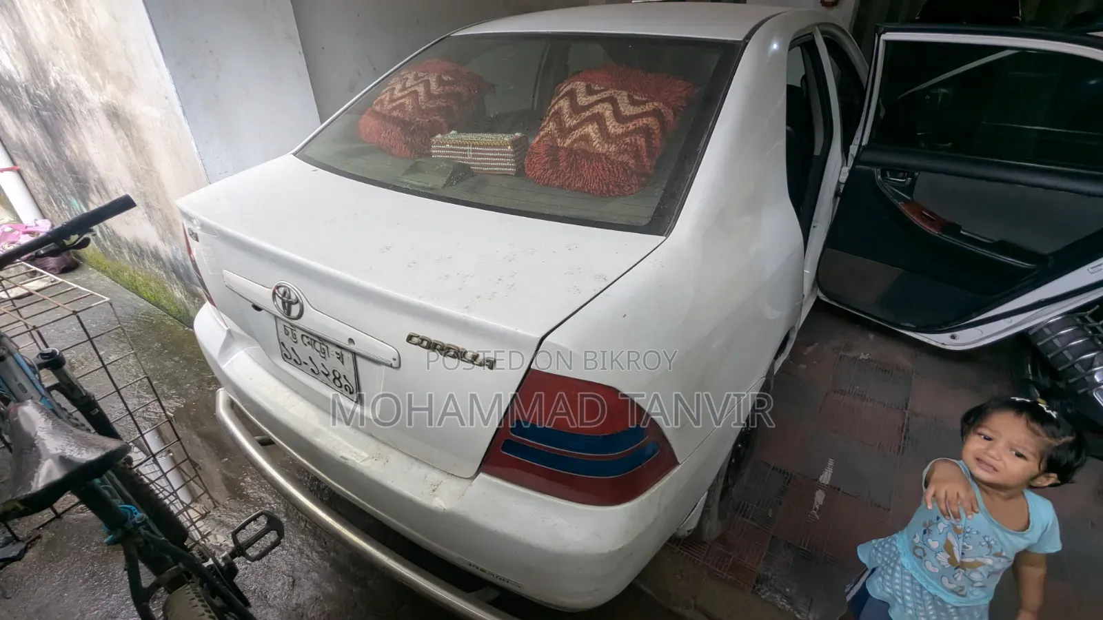 টয়োটা করোলা ২০০৩ সাদা