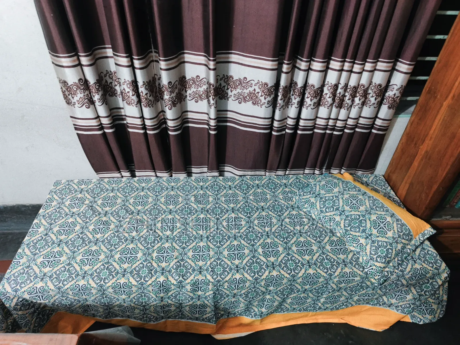 A small single bed for sale.