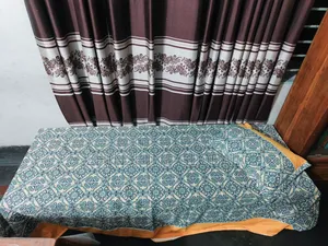 A small single bed for sale.