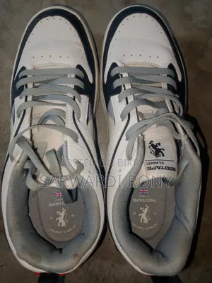 Red Tape Shoe Looks New.