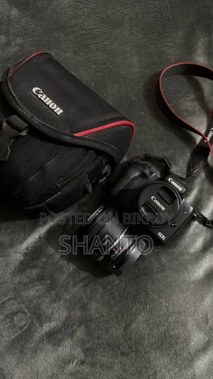 Canon M50 With Adapter And Prime Lens.