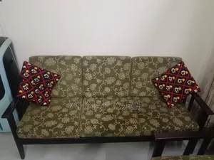 3 Sofas and a Glass Table