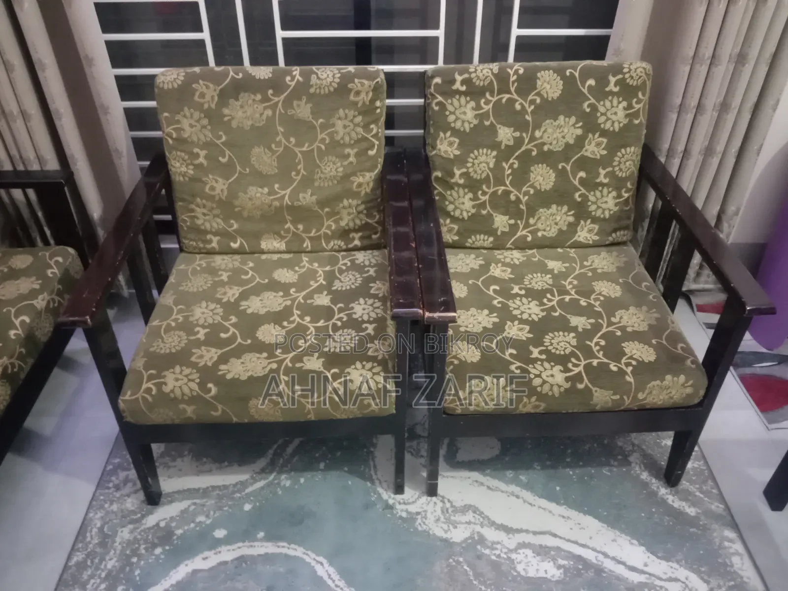 3 Sofas and a Glass Table