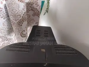 টিভি ট্রলিসহ টিভি(পুরোনো মডেলের বক্স টিভি)