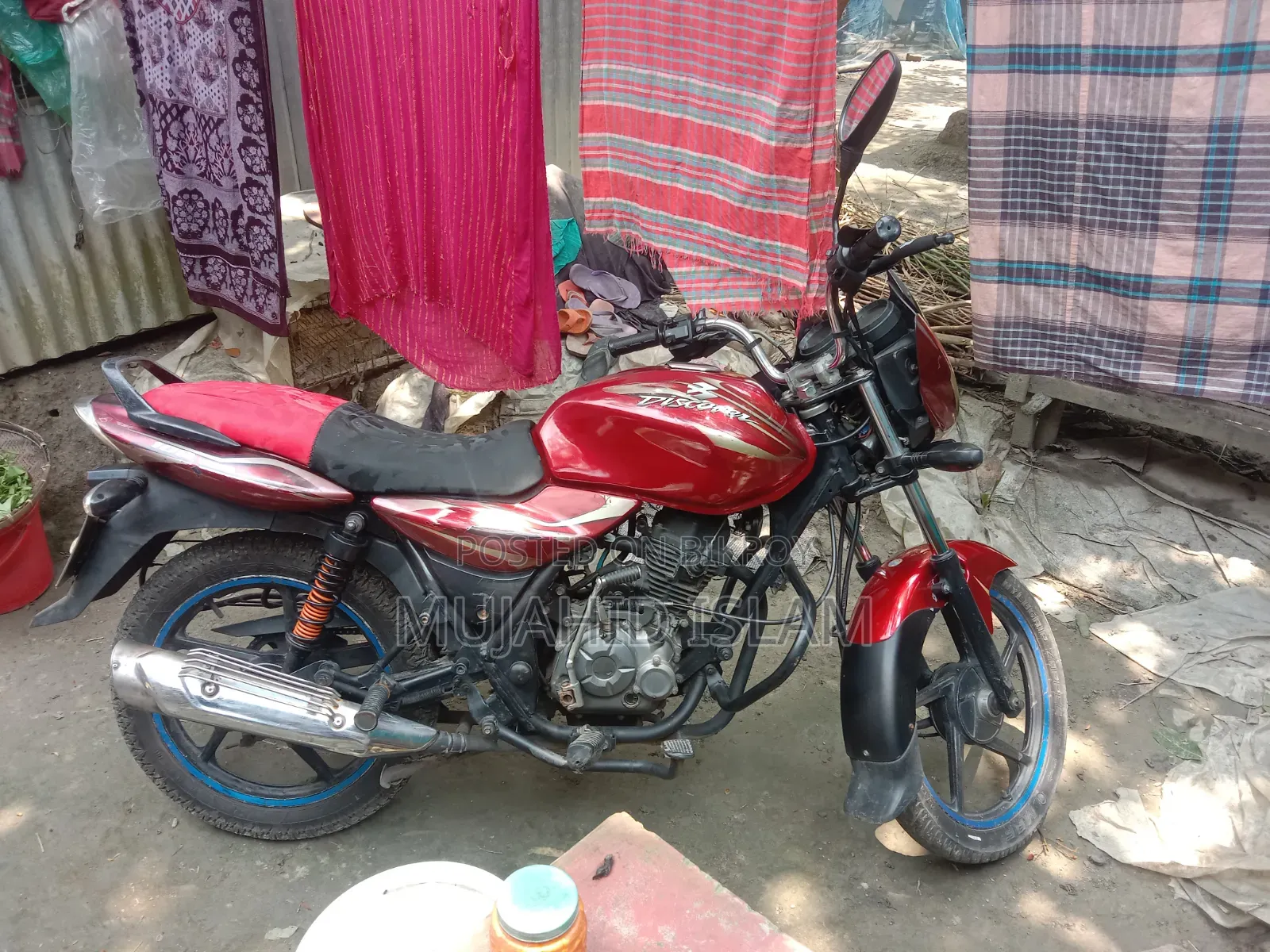 বাজাজ ডিসকভার ১০০ ২০১৬ লাল