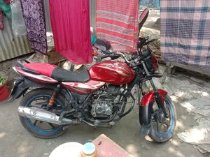বাজাজ ডিসকভার ১০০ ২০১৬ লাল