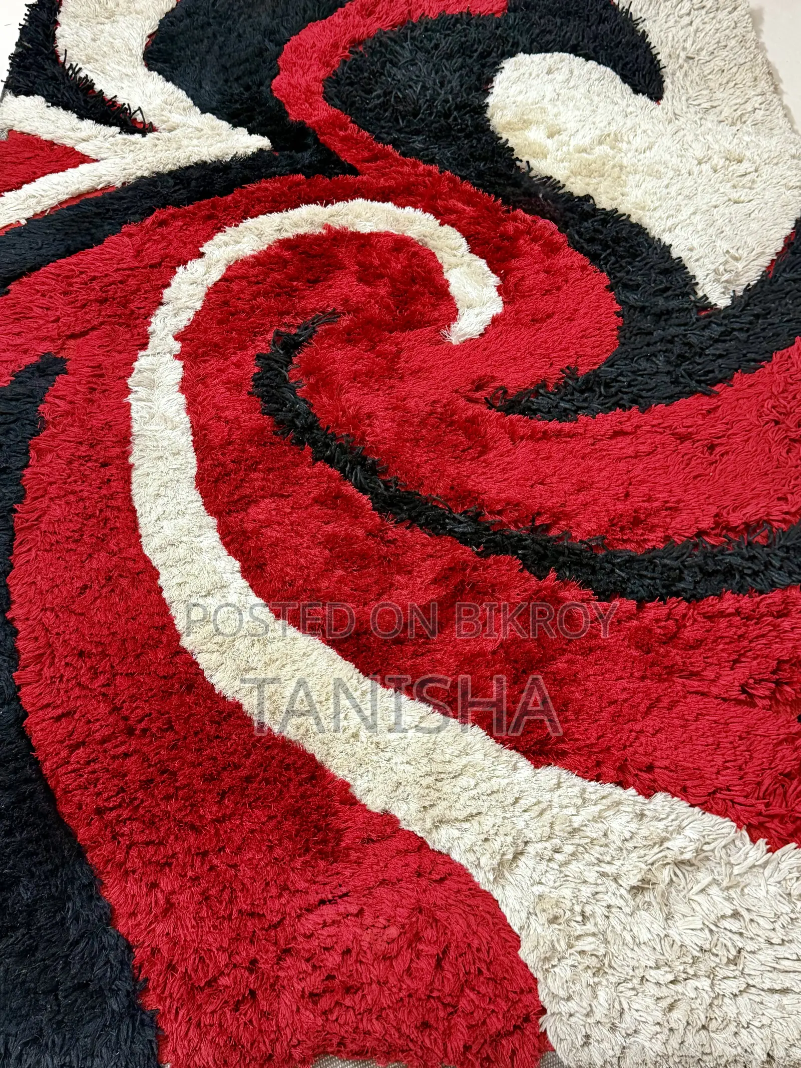 Carpet With Black, Red and White Swirls