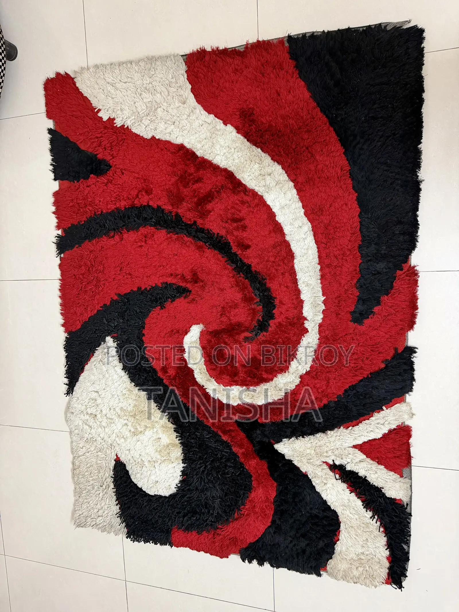 Carpet With Black, Red and White Swirls