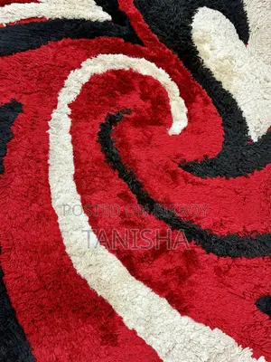 Carpet With Black, Red and White Swirls