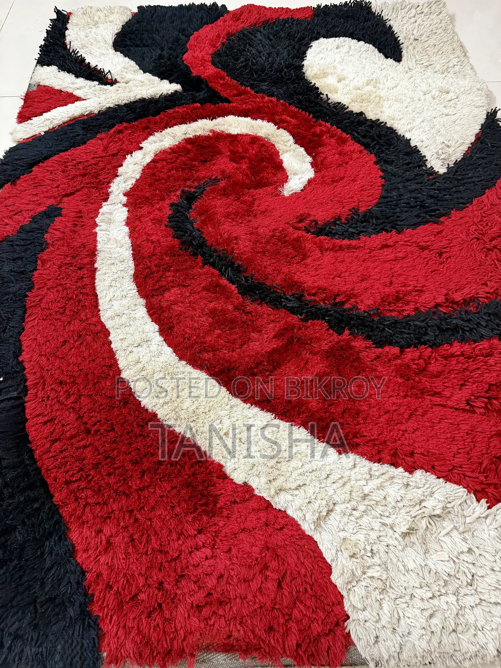 Carpet With Black, Red and White Swirls