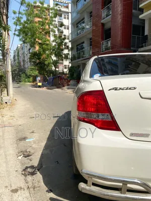 টয়োটা এক্সিও ২০১০ হোয়াইট