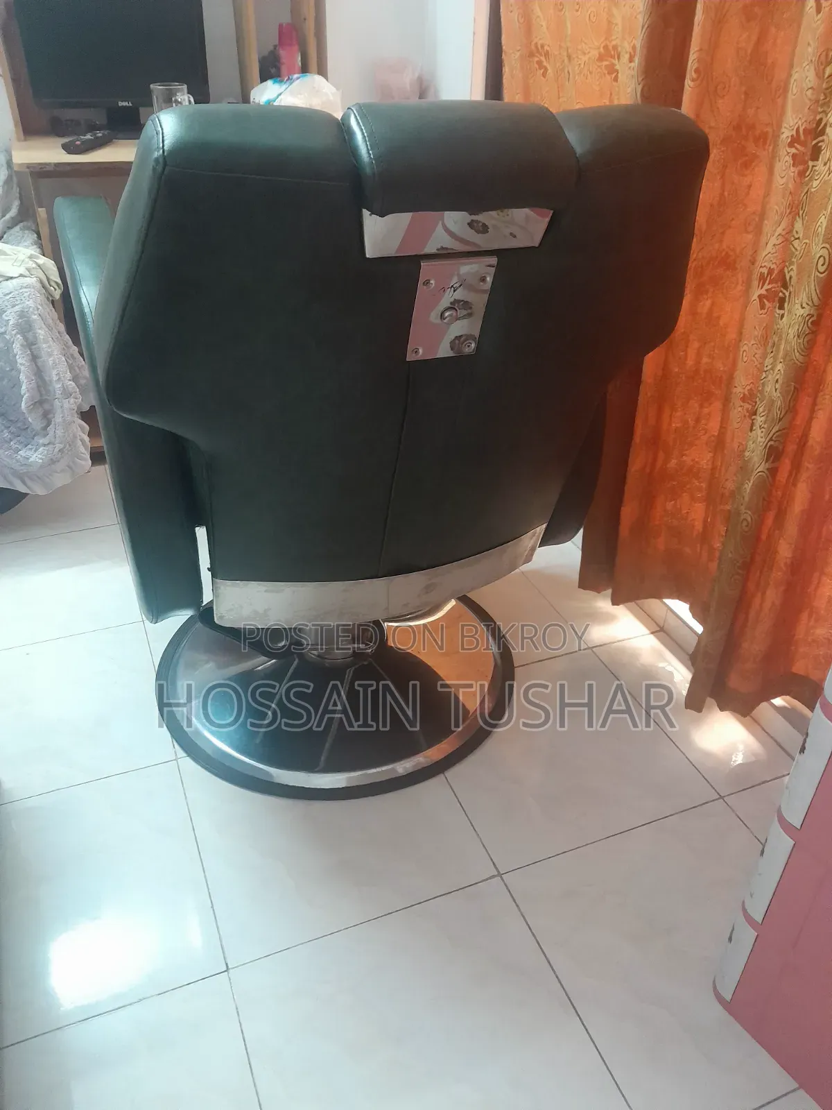 A total of 2 identical second-hand salon chairs for sale