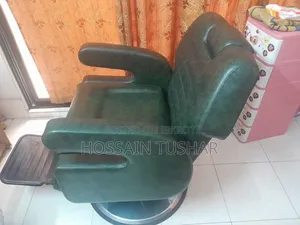 A total of 2 identical second-hand salon chairs for sale