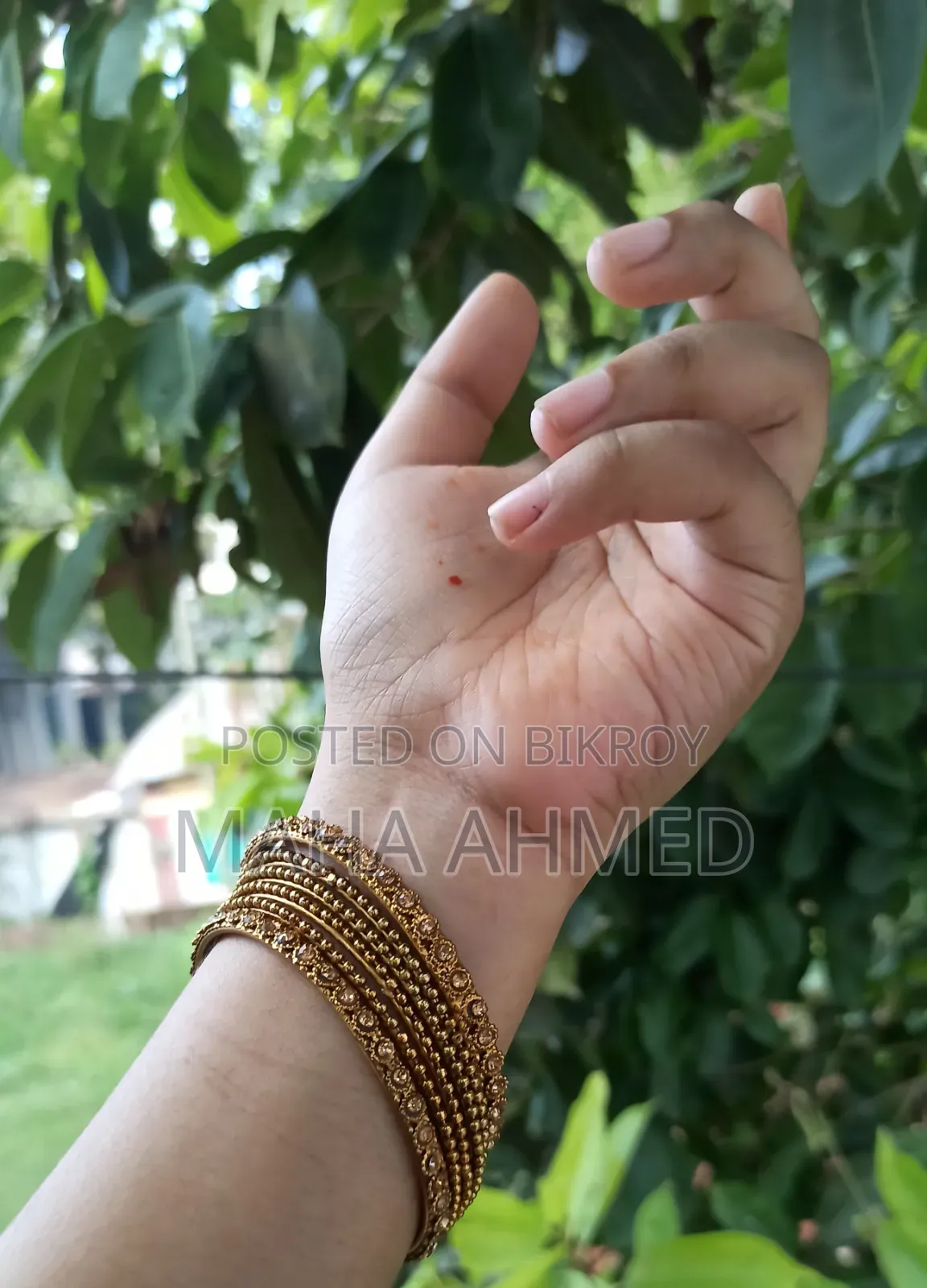Gold-colored bangles on your hands, and a handful of happiness in your heart.