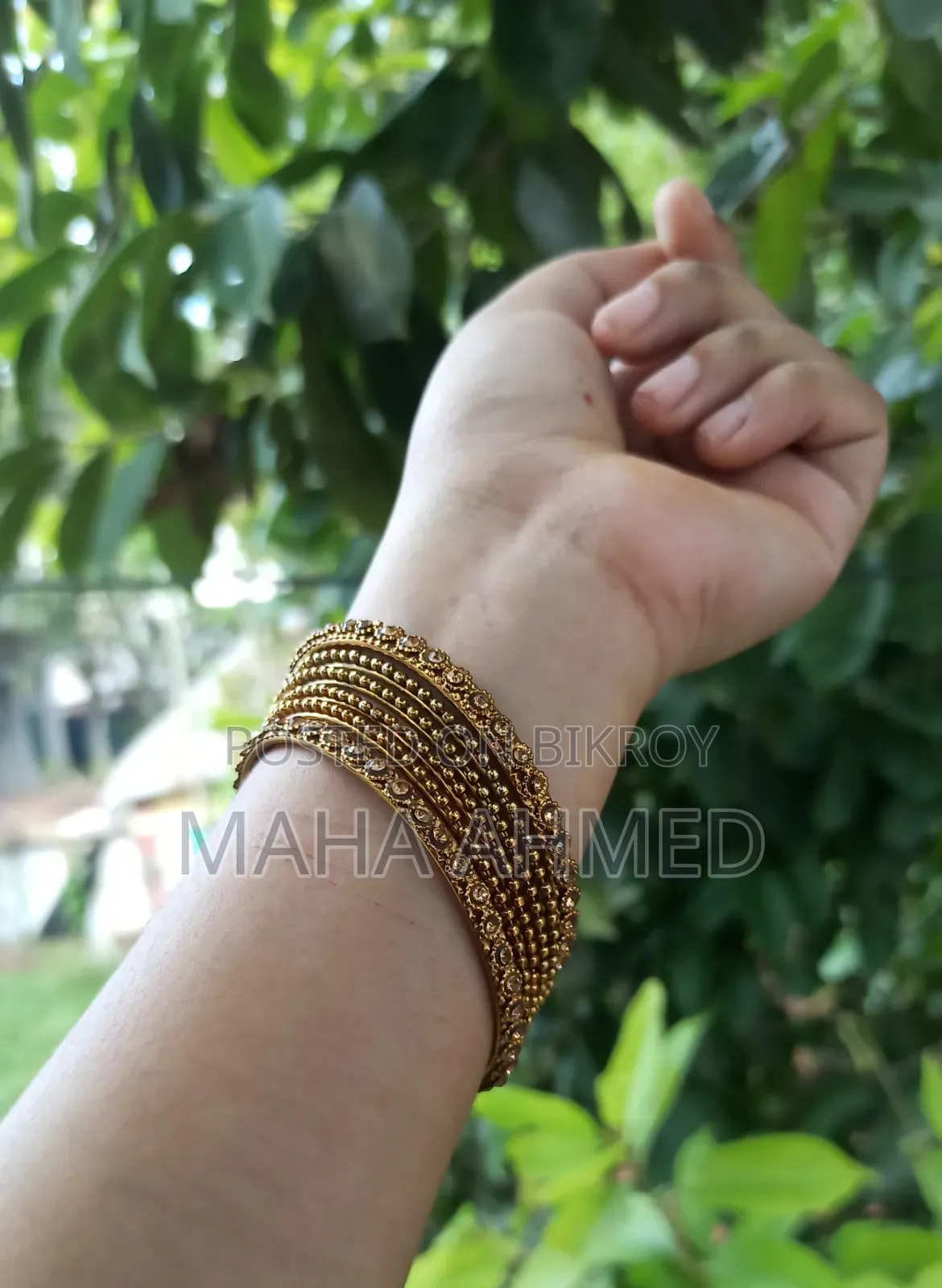 Gold-colored bangles on your hands, and a handful of happiness in your heart.