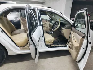 টয়োটা করোলা ২০০৩ হোয়াইট