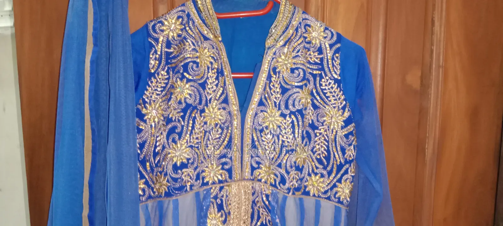 Beautiful, flawless, heavily embroidered dress. Looks as good as new