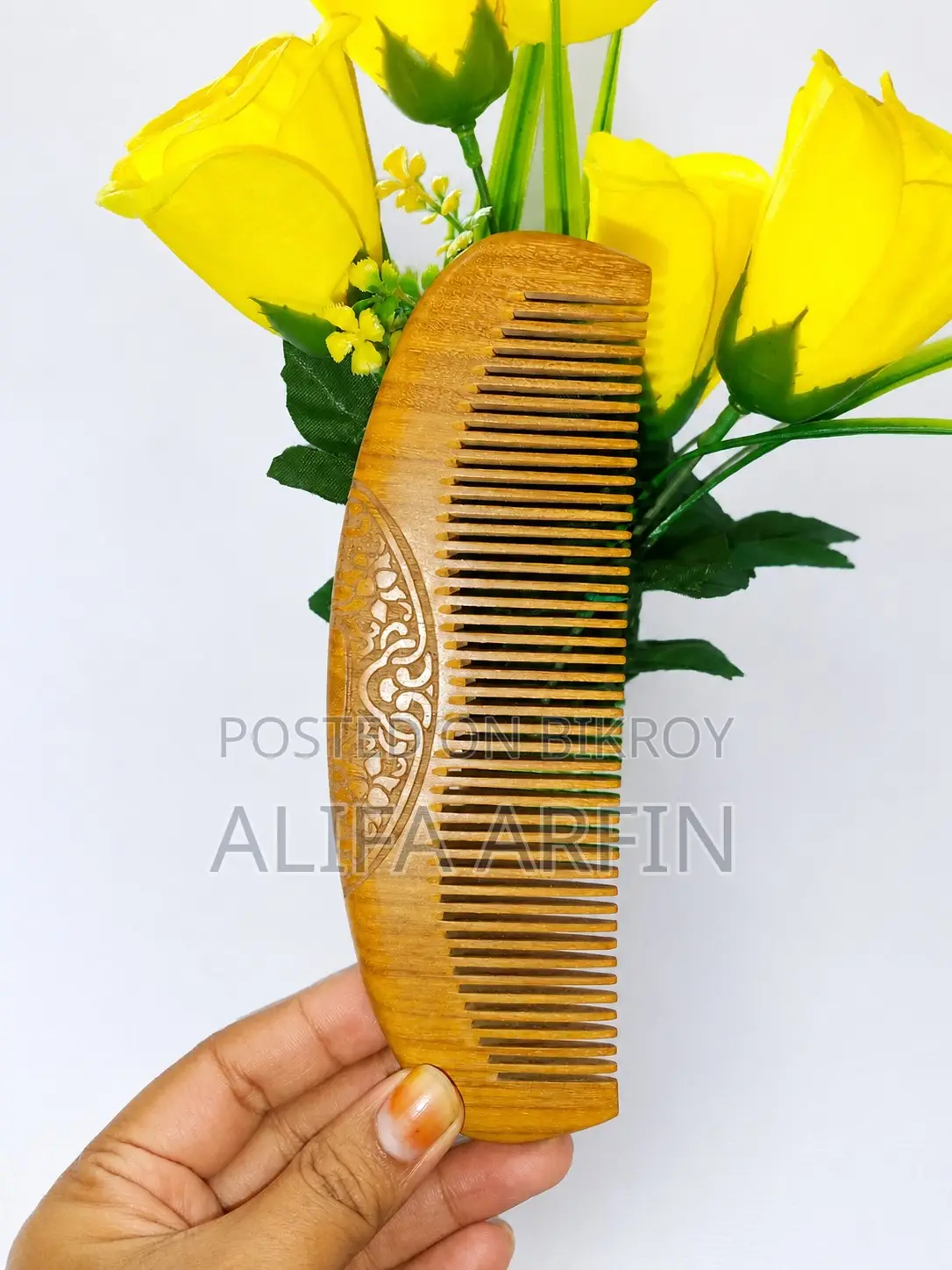 Restore hair beauty with natural care using a sandalwood comb