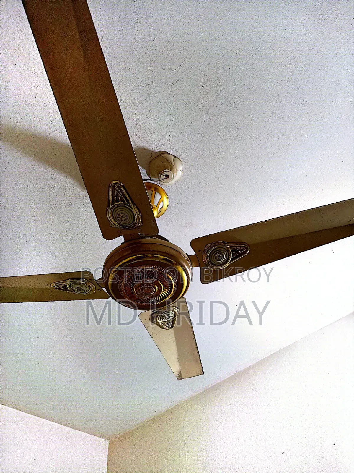 A 56-inch four-blade fan for sale in fresh condition.