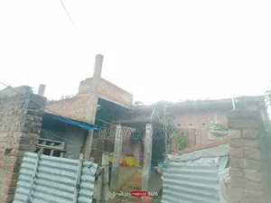 Land with house for urgent sale