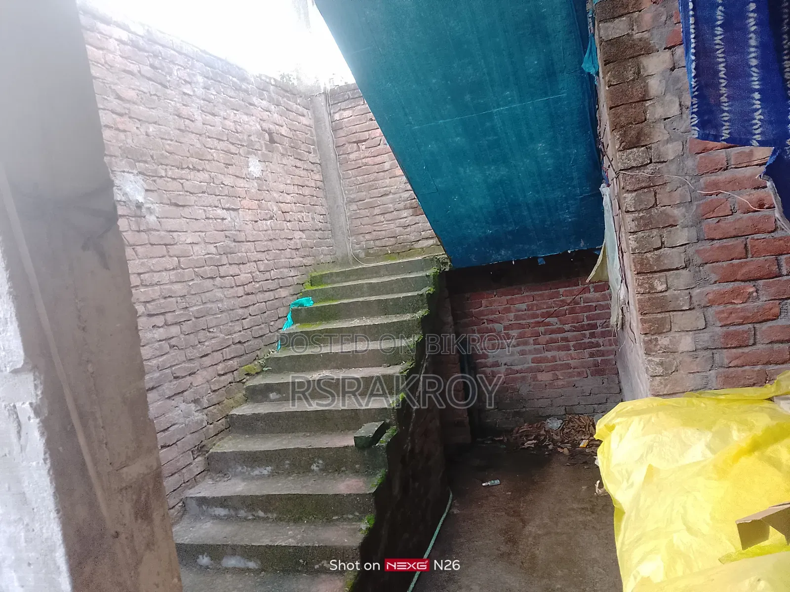 Land with house for urgent sale