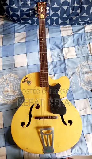 It's a Givson Acoustic Guitar. I'm Selling It in Dhaka. Contact WhatsApp