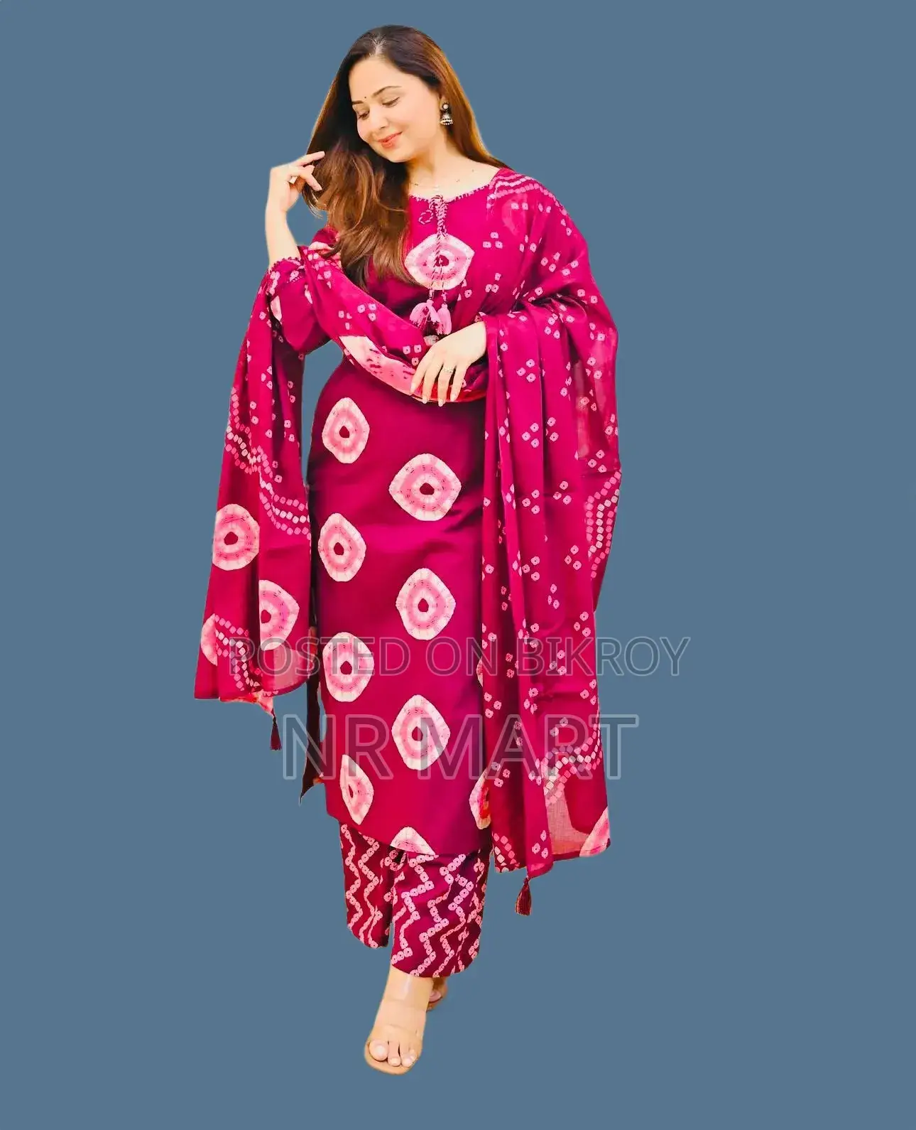 Soft cotton fabric Chunri print three-piece collection with tassels.