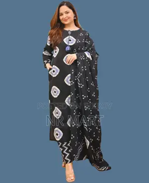 Soft cotton fabric Chunri print three-piece collection with tassels.
