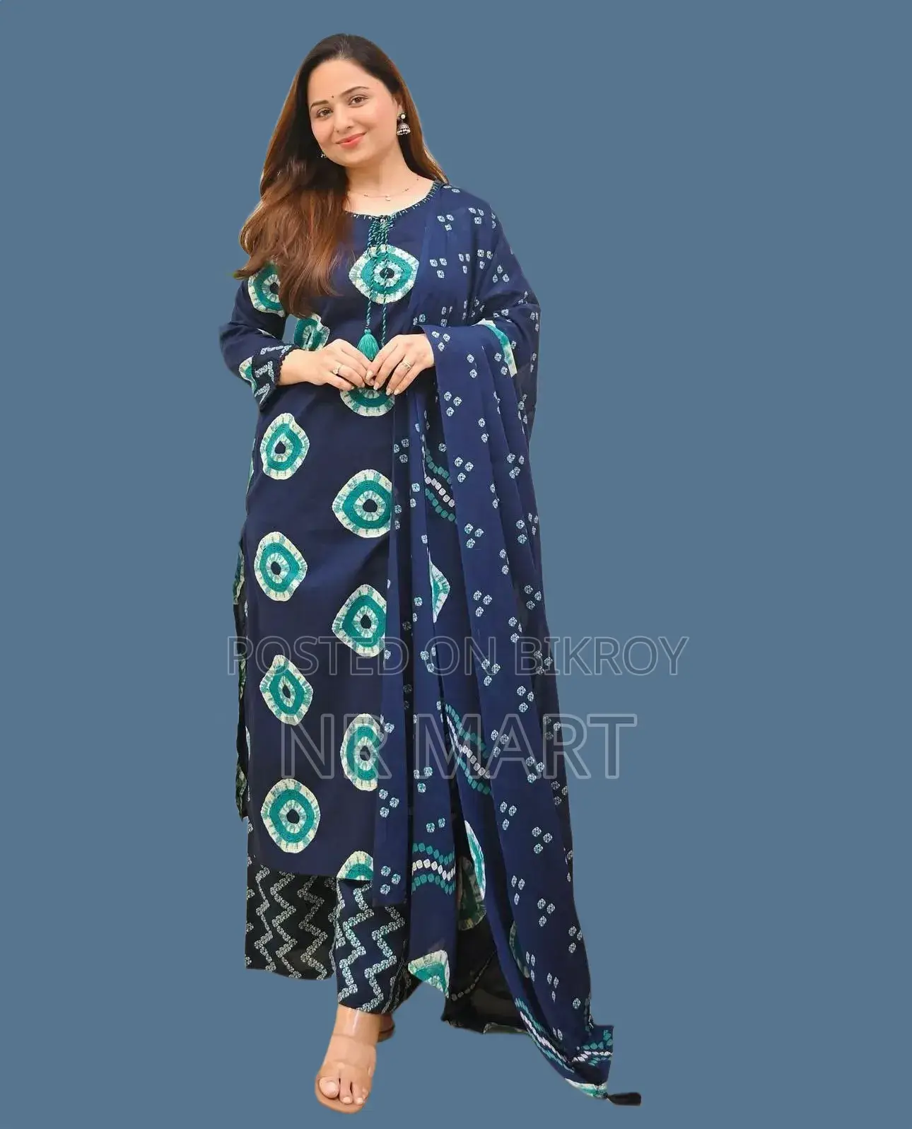Soft cotton fabric Chunri print three-piece collection with tassels.