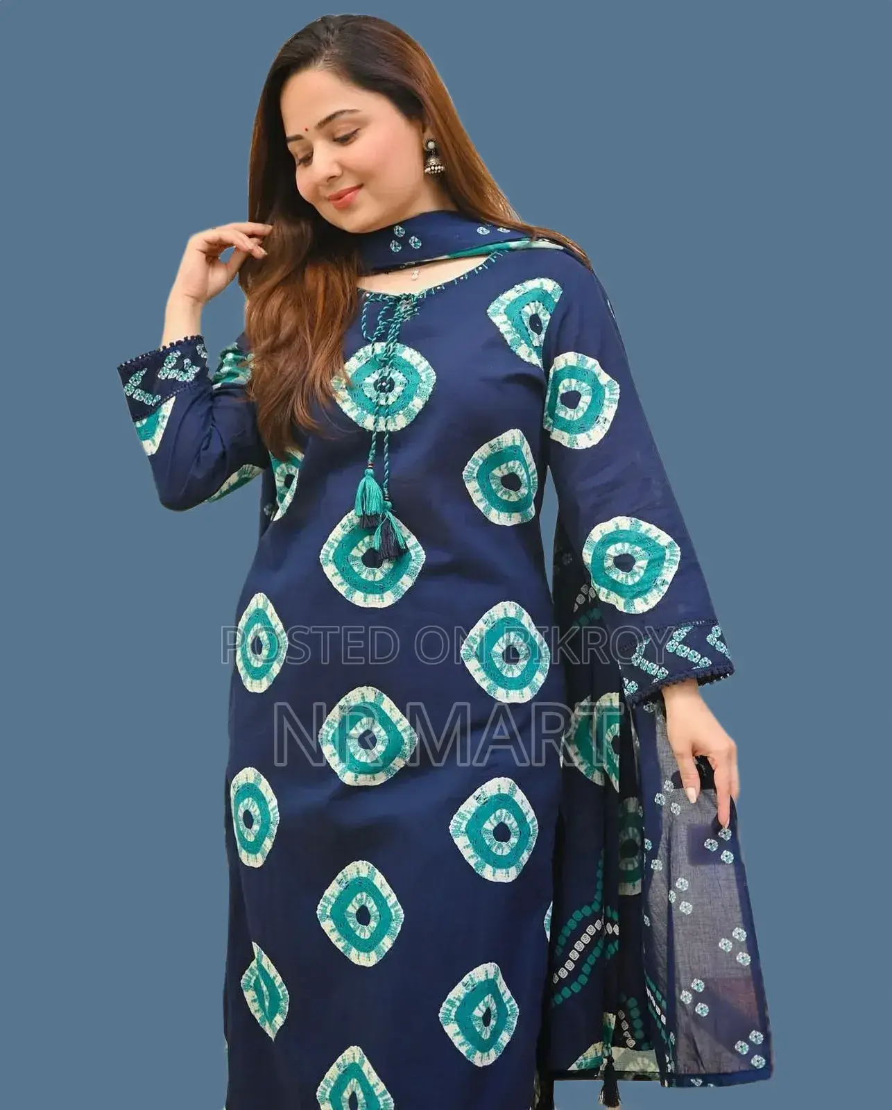 Soft cotton fabric Chunri print three-piece collection with tassels.