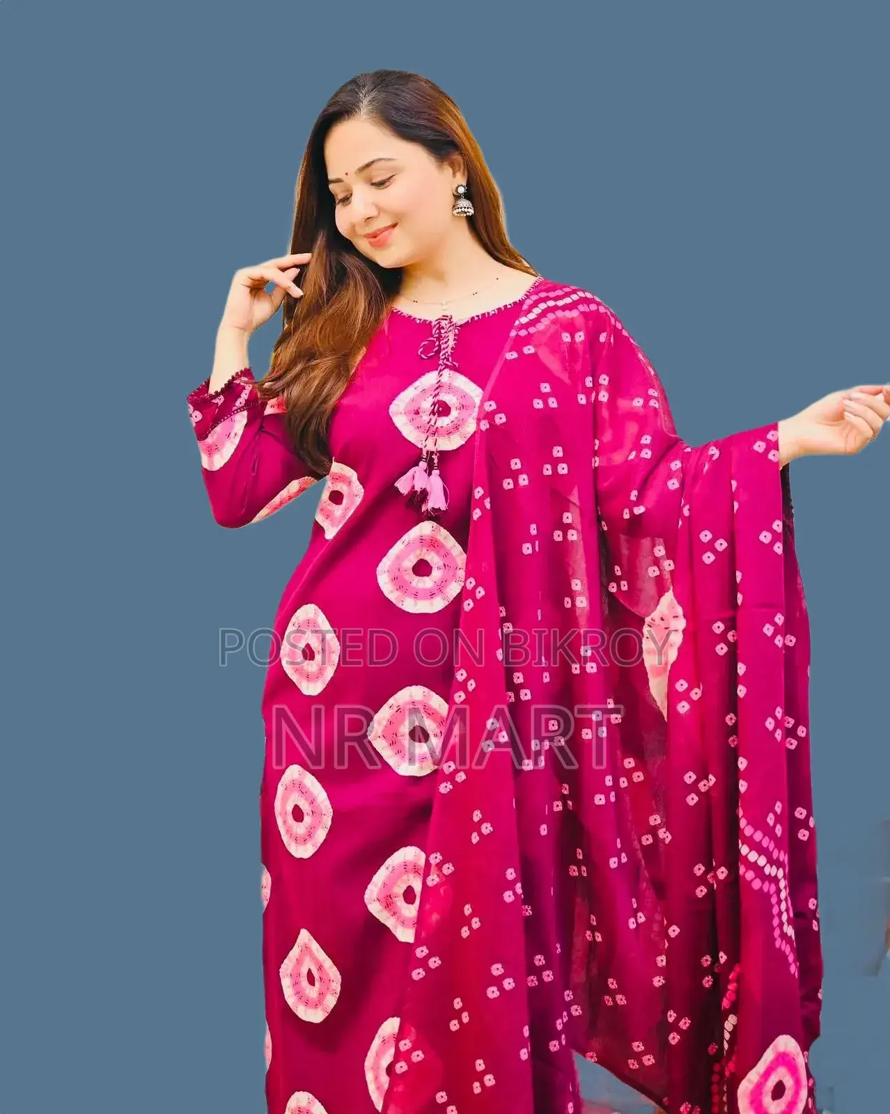 Soft cotton fabric Chunri print three-piece collection with tassels.