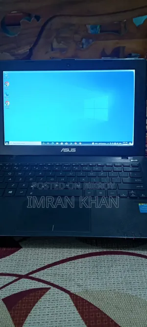 ল্যাপটপ আসুস এন২০এ ২জিবি ইন্টেল সেলেরন এইচডিডি ১২৮জিবি