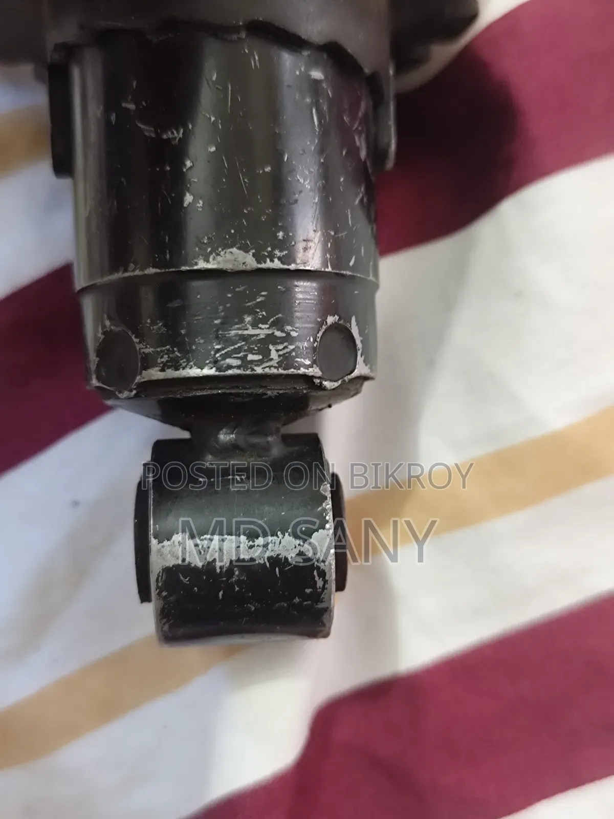 4v বাইকের পিছনের সাচপেনশন