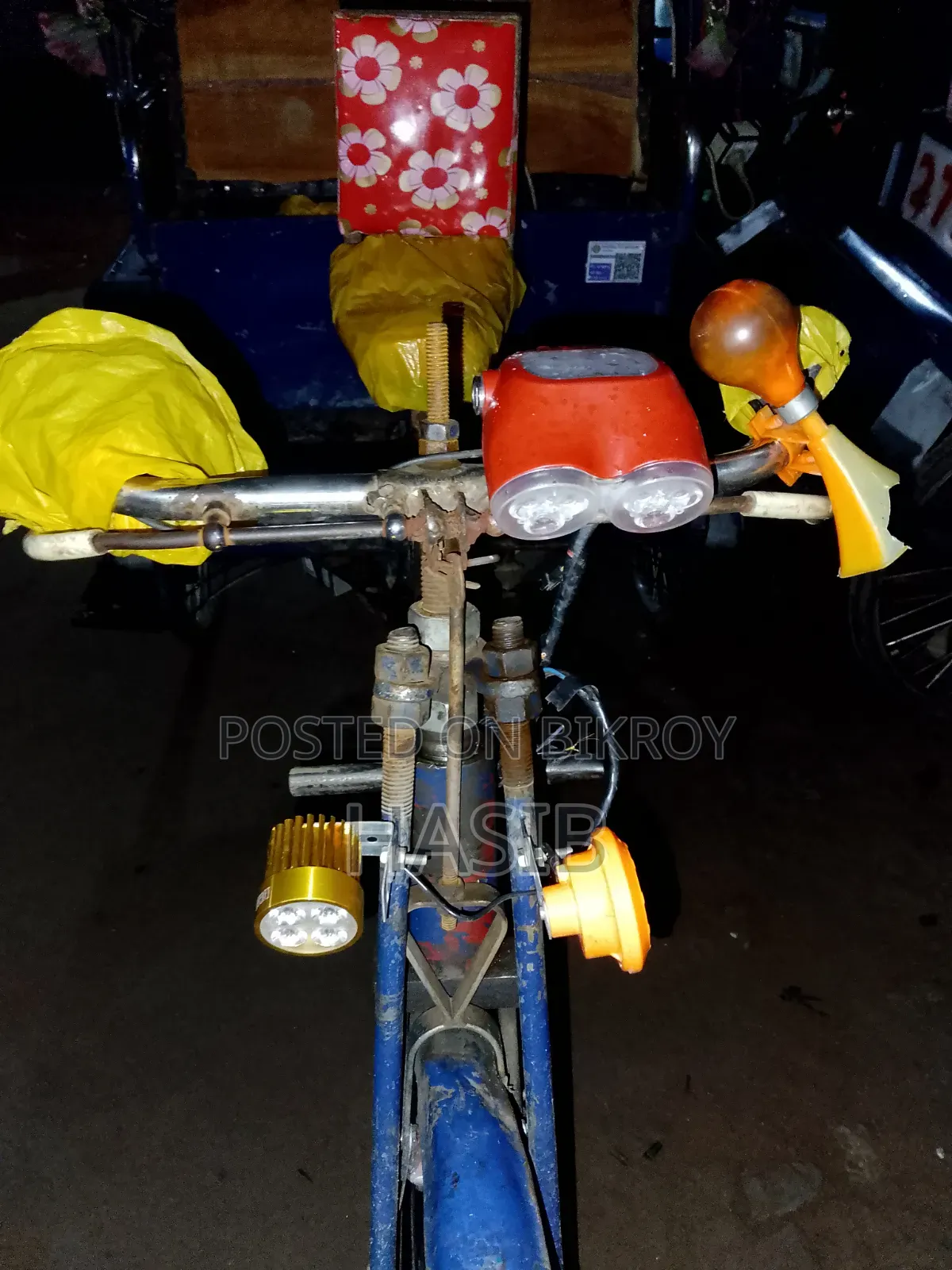 A battery-operated rickshaw